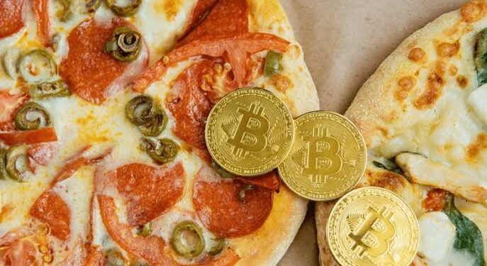 100 bitcoins to buy a pizza
